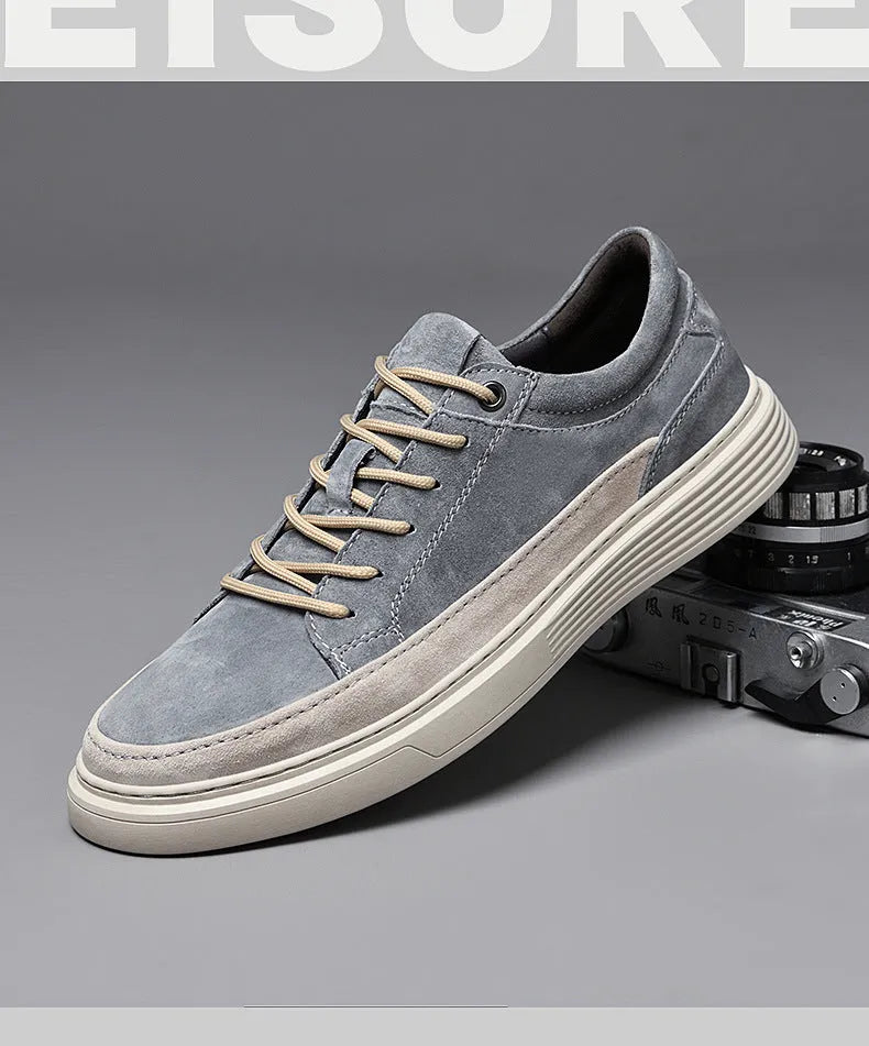Men's grey casual leather skate shoes with round toe and lace-up front.