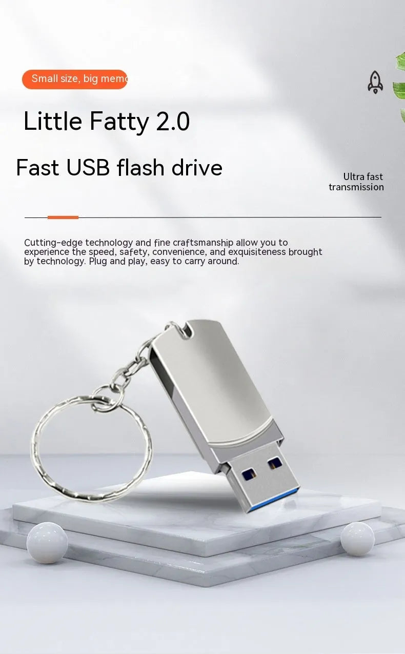 White rotating metal USB 3.0 flash drive in compact small fat design on a grey background.