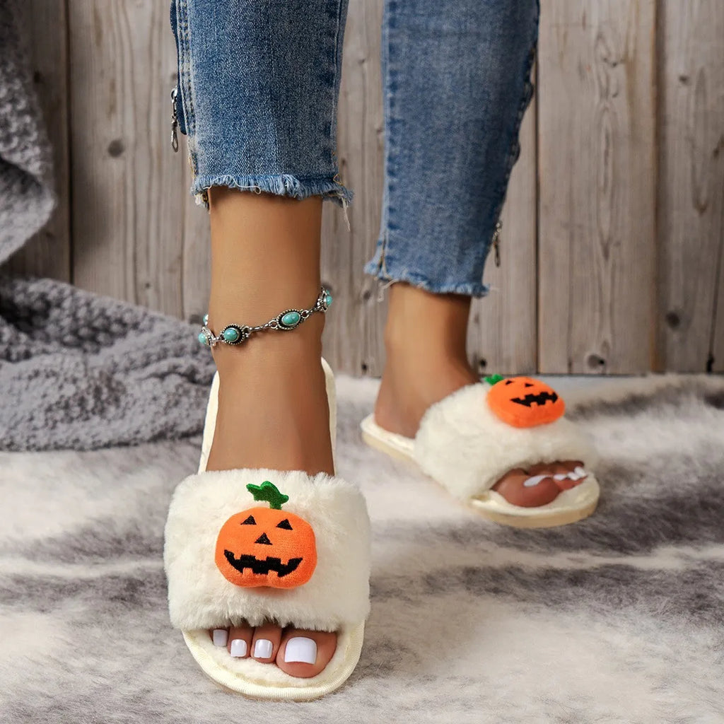Yellow Halloween pumpkin cartoon design open toe slippers with soft synthetic fur upper.