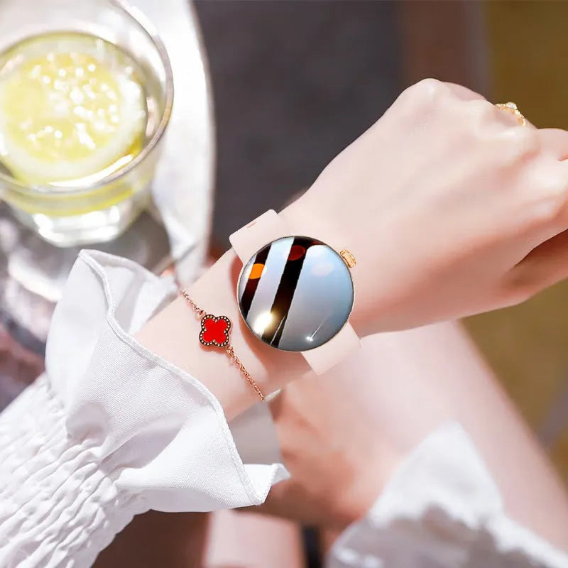 Female smart watch with circular dial, metal strap, and color screen showing heart rate data