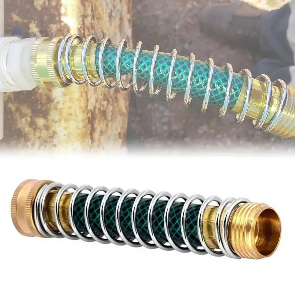 Brass garden hose connector with visible spiral spring, shown next to a measuring tape indicating 15 cm length.