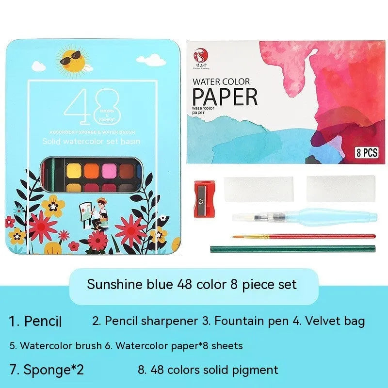 48 colour solid watercolour paint set showing compartmentalised layout with Black Knight, Girl Pink and Sunshine Blue shades