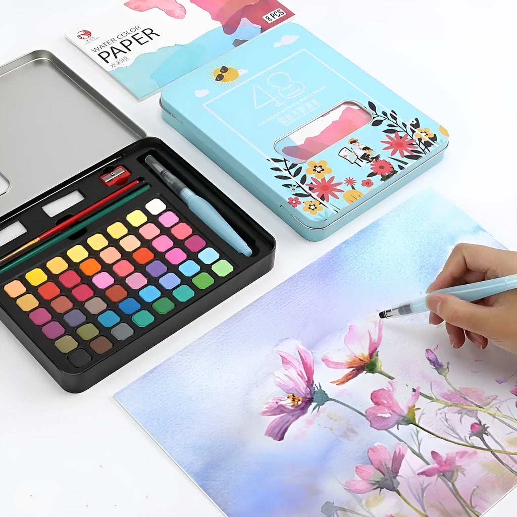 48 colour solid watercolour paint set showing compartmentalised layout with Black Knight, Girl Pink and Sunshine Blue shades
