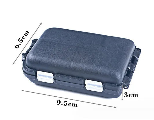 Black plastic fishing tackle storage box with ten small compartments open.