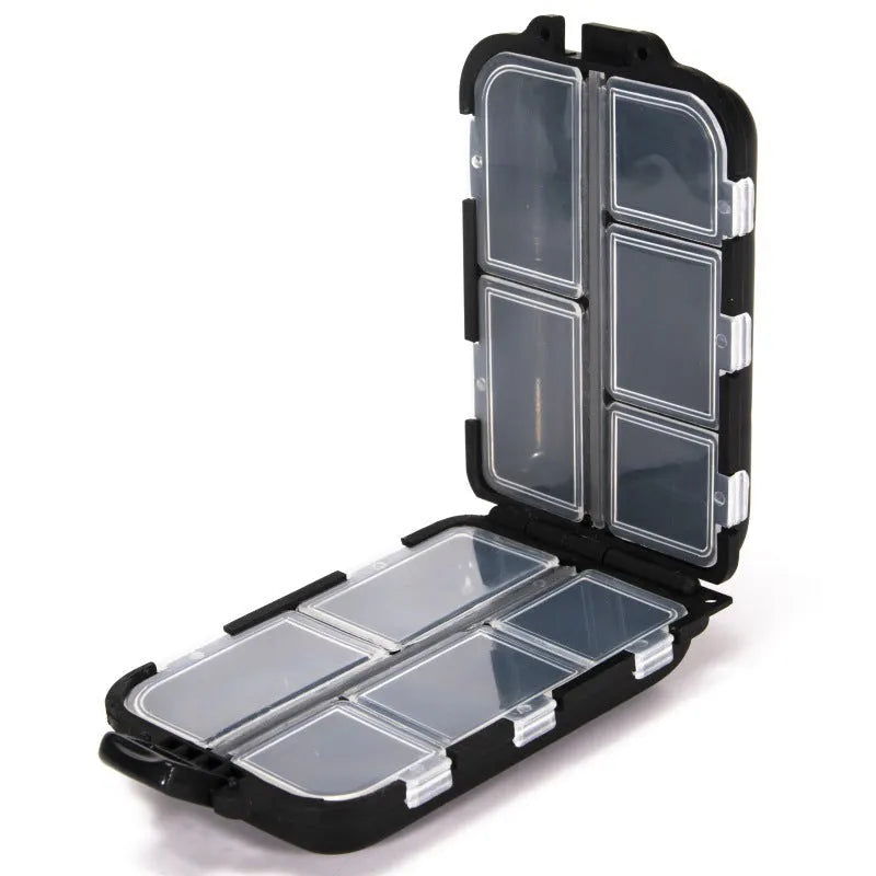 Black plastic fishing tackle storage box with ten small compartments open.