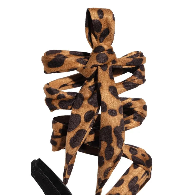 Light brown leopard print Roman-style women's high heels with cross straps and thin 8cm heel