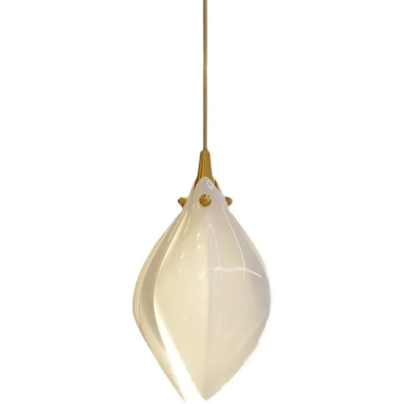 Ceramic magnolia petal-shaped single head pendant light with a dimmable fitting against a neutral background.