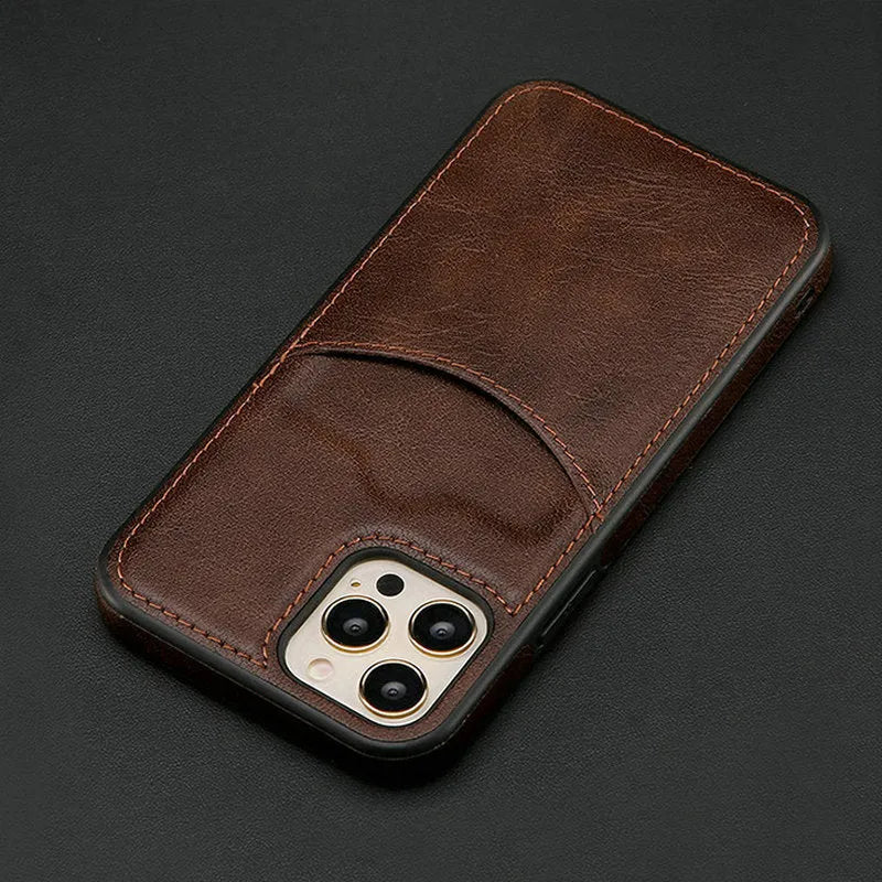 Dark blue PU leather protective case for iPhone models on a table.