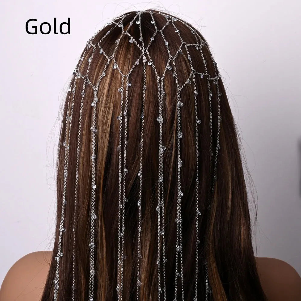 Gold mesh rhinestone headband with tassel detail showing electroplated finish and decorative elements
