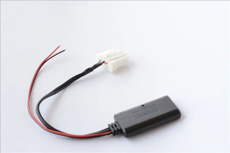 Black Bluetooth audio adapter cable for Mazda cars with AUX port, compatible with models from 2006.