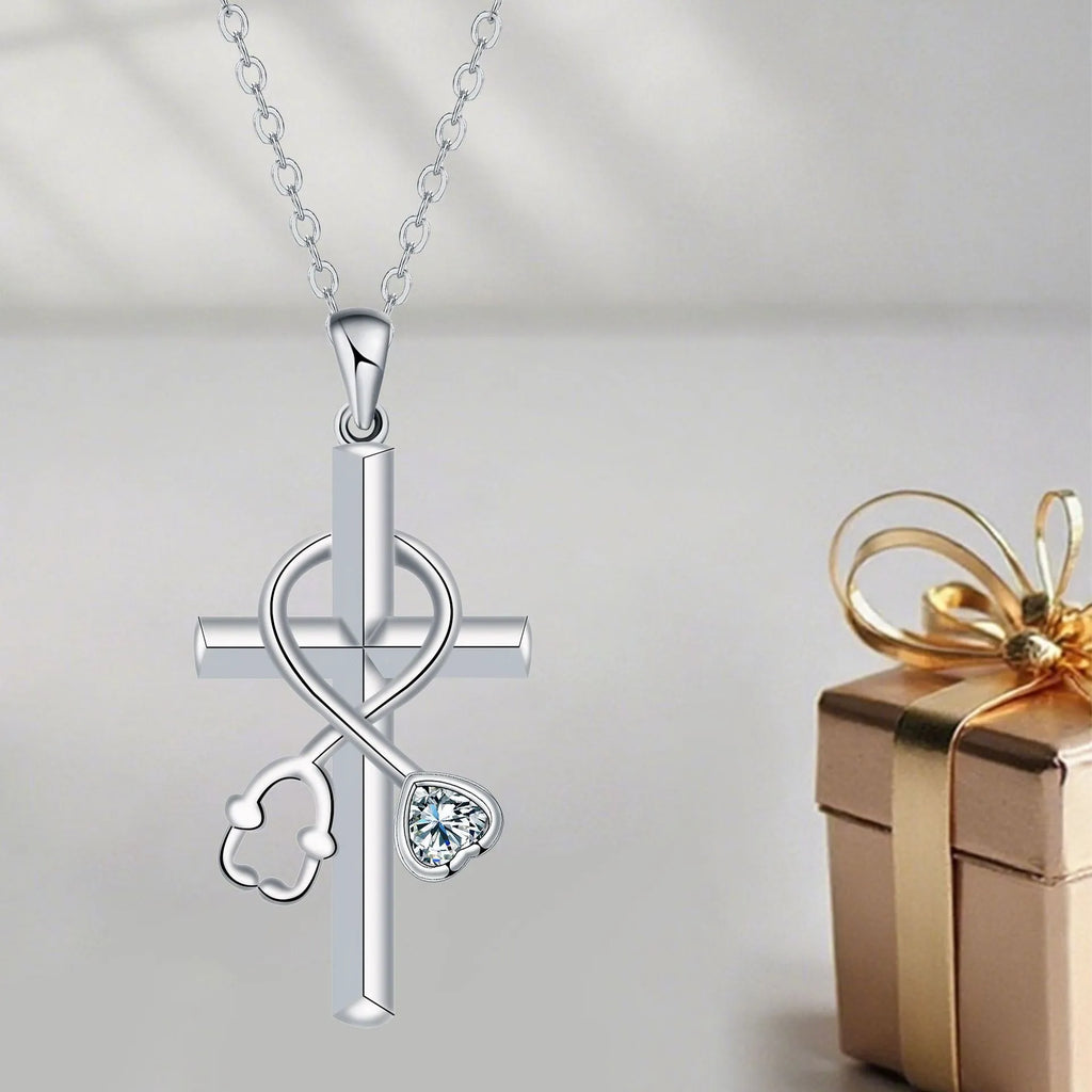 Close-up of a copper stethoscope pendant necklace on a cross chain for medical professionals