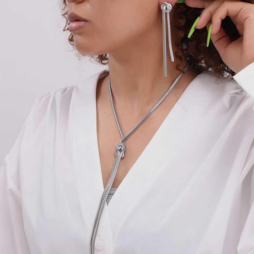 Gold titanium steel knotted tassel necklace and matching earrings set with snake chain