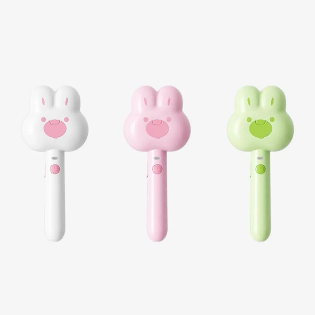 Rechargeable pet grooming comb with steam function in green, pink or white colours