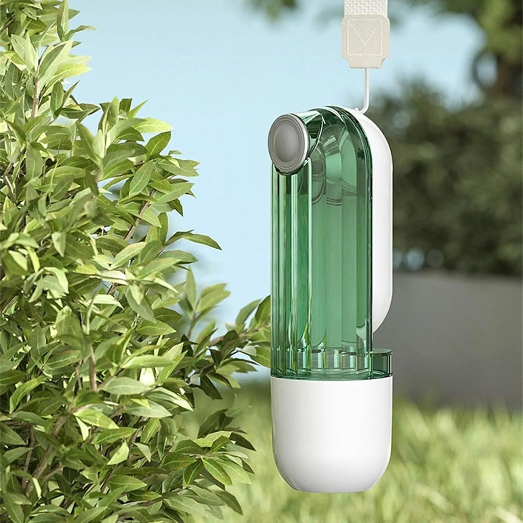 Beige foldable dog water bottle with integrated food container for outdoor walks.