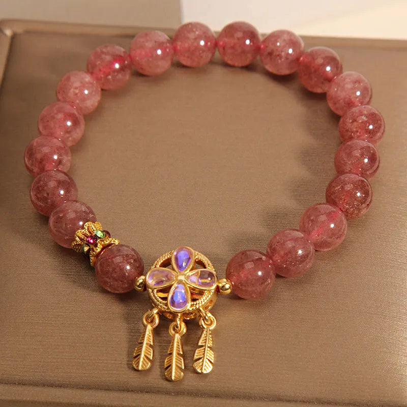 Natural strawberry quartz bracelet with four leaf clover dream catcher pendant on adjustable cord