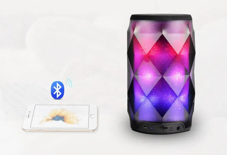 Black crystal diamond-cut Coke can shaped lantern and Bluetooth speaker with colourful LED lights.