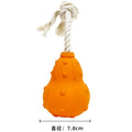 A natural rubber stuffable dog toy for small to medium breeds, shown with a hollow centre for treats.