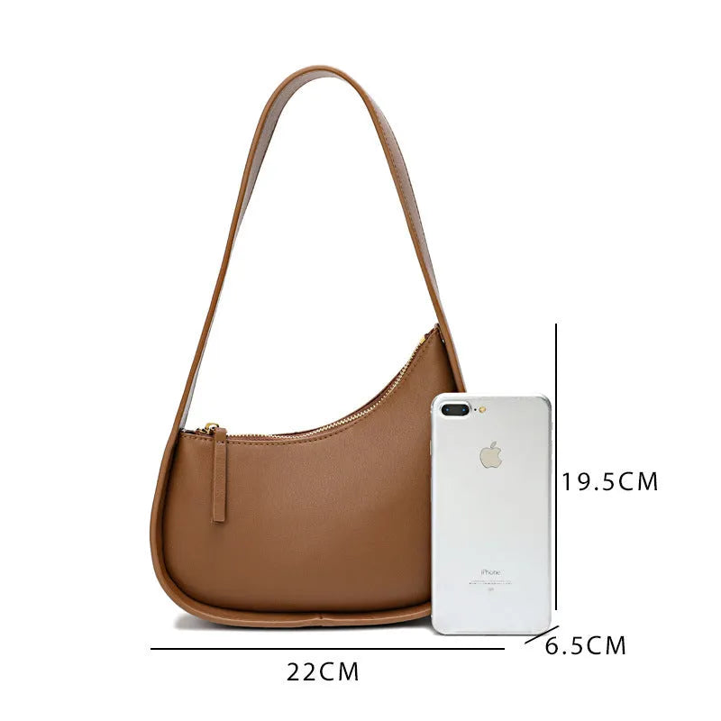 Genuine leather half moon shaped women's handbag with wide shoulder strap in four colour options