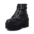 Black women's punk style Martin boots with bat buckle and side zip closure
