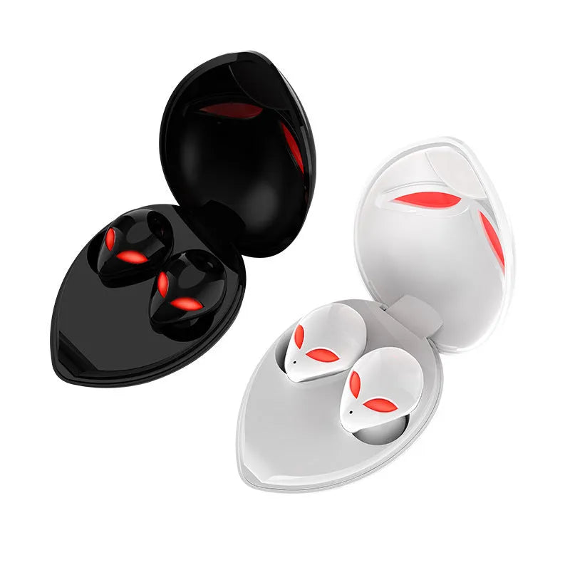 Alien-design T8 Starman Bluetooth headphones in charging case on white background