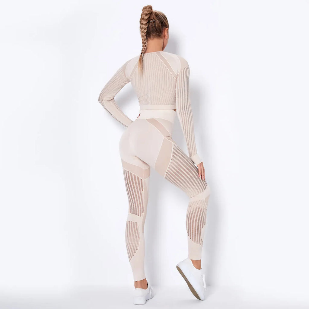 Women's long-sleeved seamless knitted yoga suit in a stripe pattern, shown in navy blue.