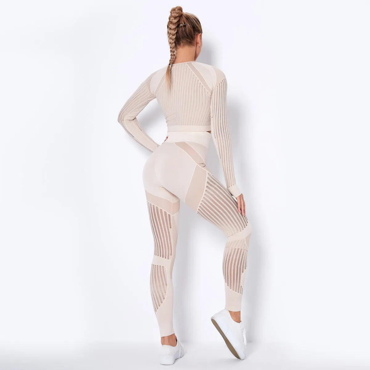 Women's long-sleeved seamless knitted yoga suit in a stripe pattern, shown in navy blue.