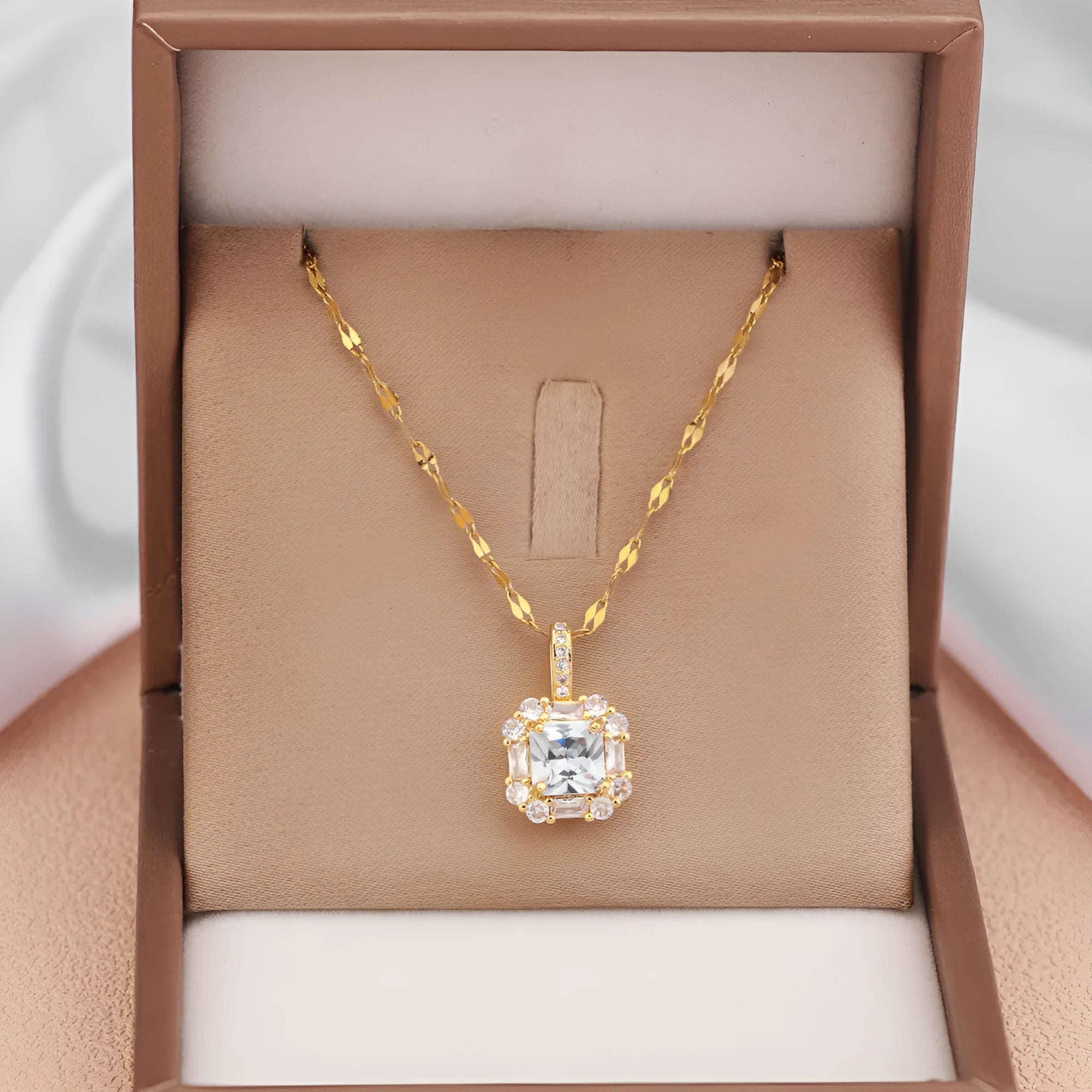 Women's gold titanium steel necklace with quadrilateral gem-inlaid pendant on water wave chain