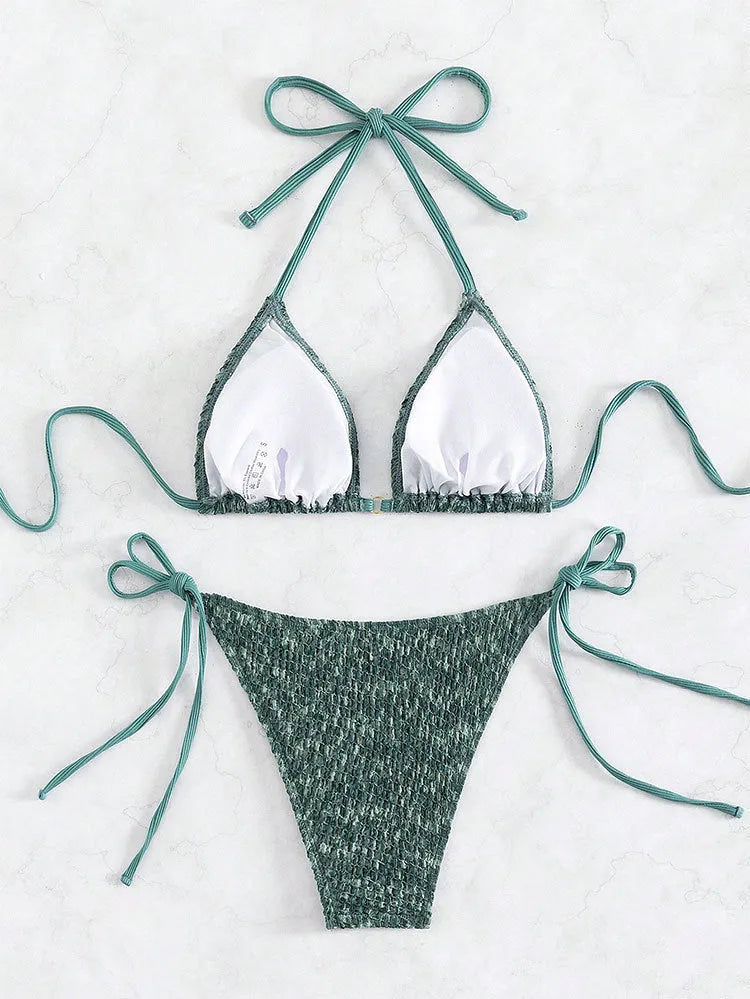 Green women's backless halter swimsuit bikini set with matching shorts