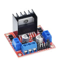 L298N dual H-bridge motor driver module on a green PCB with screw terminals