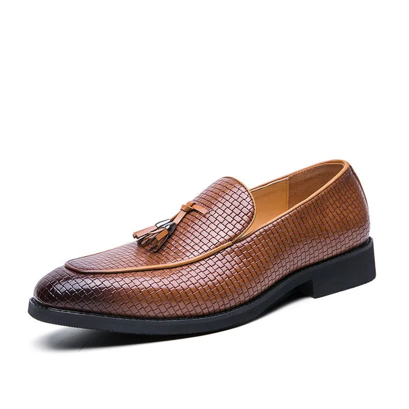 Men's black pointed slip-on shoe with a tassel on a business-style artificial PU upper.