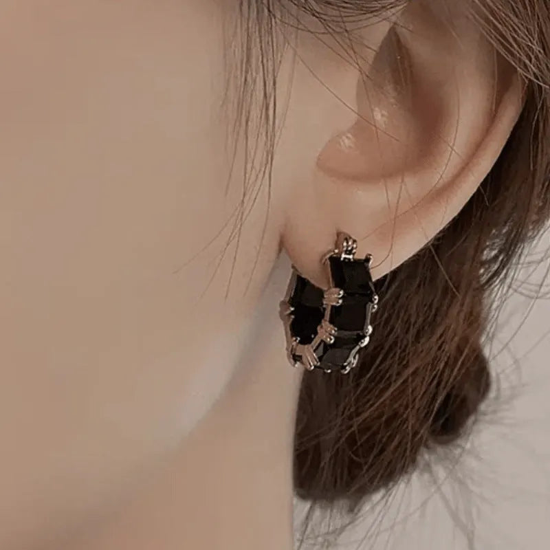 Geometric U-shaped women's earrings with round crystal zirconium stones in gold electroplated copper setting