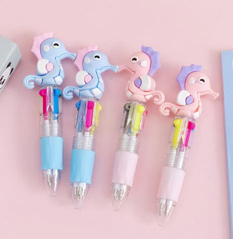 Cartoon theme four-colour press ballpoint pen with silicone grip and 0.7mm tip