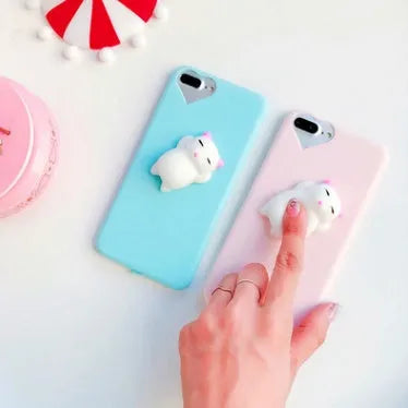 Soft cat iPhone case with 3D cartoon design in pink colour showing squishy TPU silicone construction