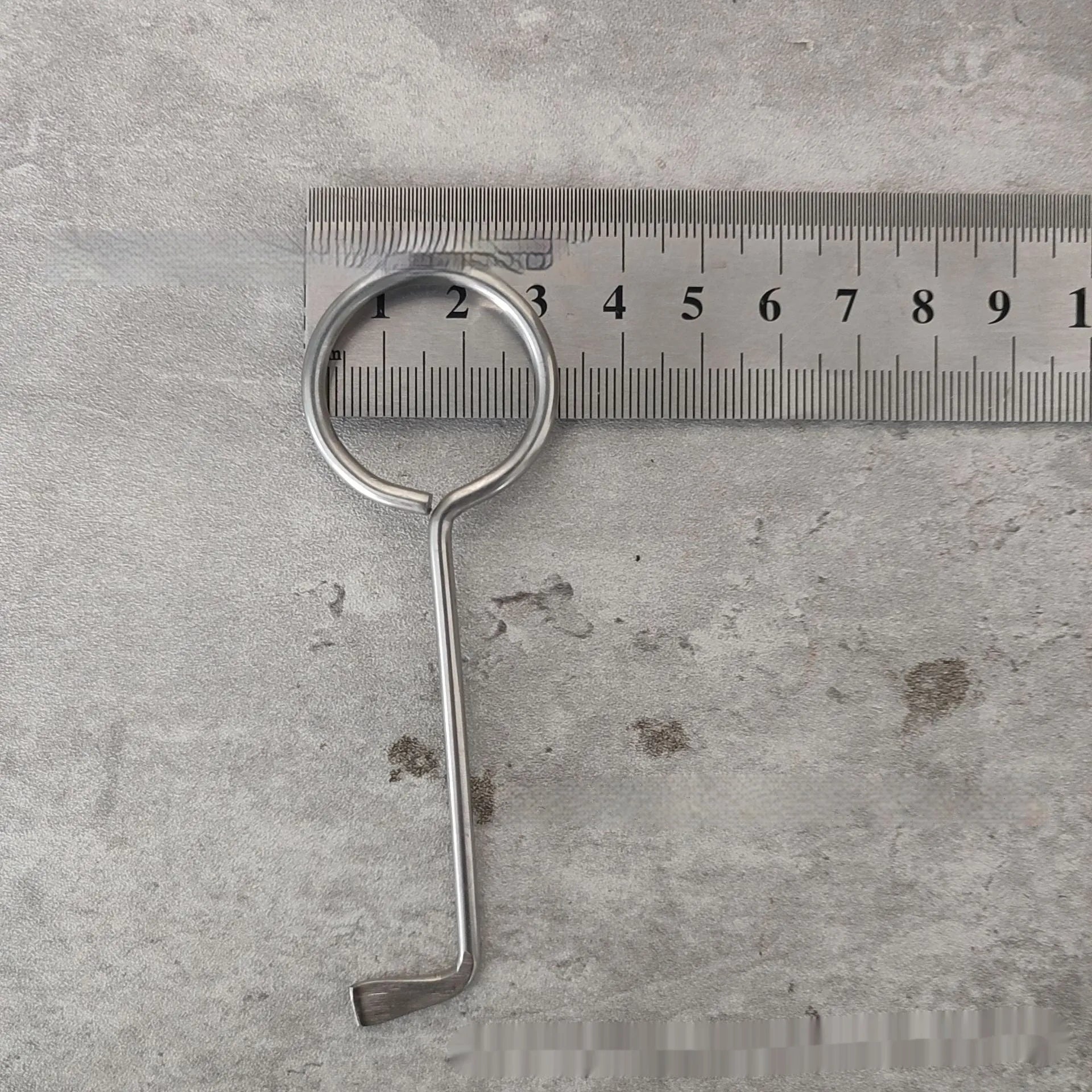 Two silver alloy wrench tools from a portable universal tool set.