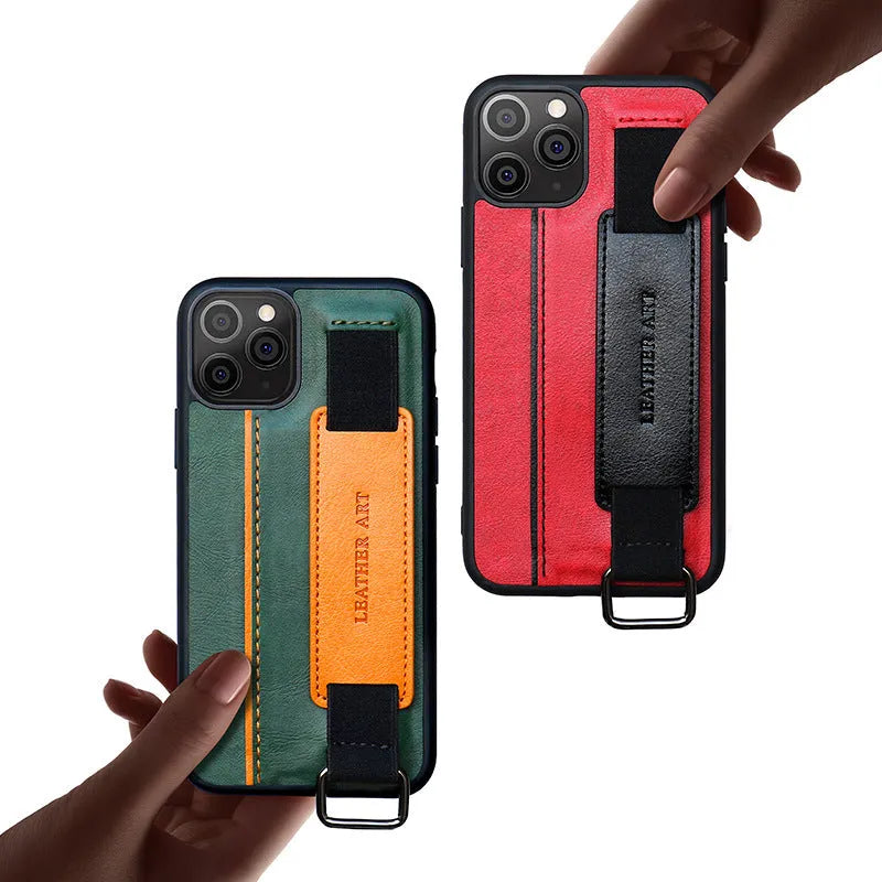 Imitation leather iPhone case with an adjustable wrist strap in brown colour with stitching detail.