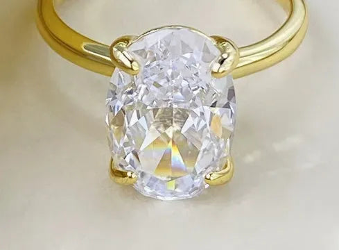 Women's oval ring with four-claw setting in 9 silver, gold and silver colour options