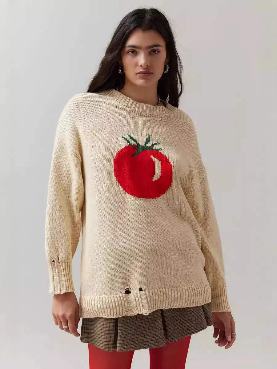 Women's milky white acrylic round neck sweater with jacquard long sleeves, laid flat.