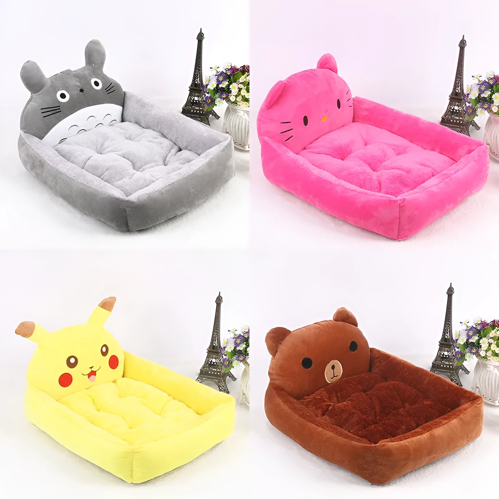 A colourful cartoon-style sofa bed for small pets, shown in blue, with raised edges for comfort.