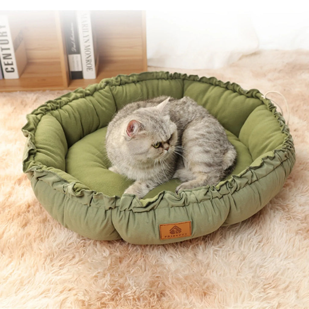 Grey reversible donut cat bed with removable cushion for indoor pets