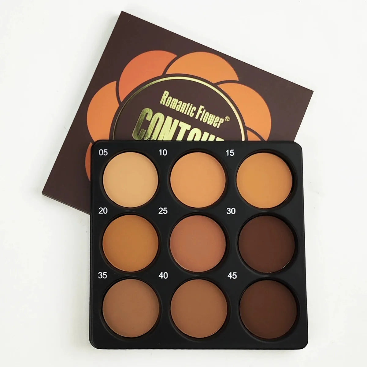 Dark matte makeup palette with nine colours and a repair disk.