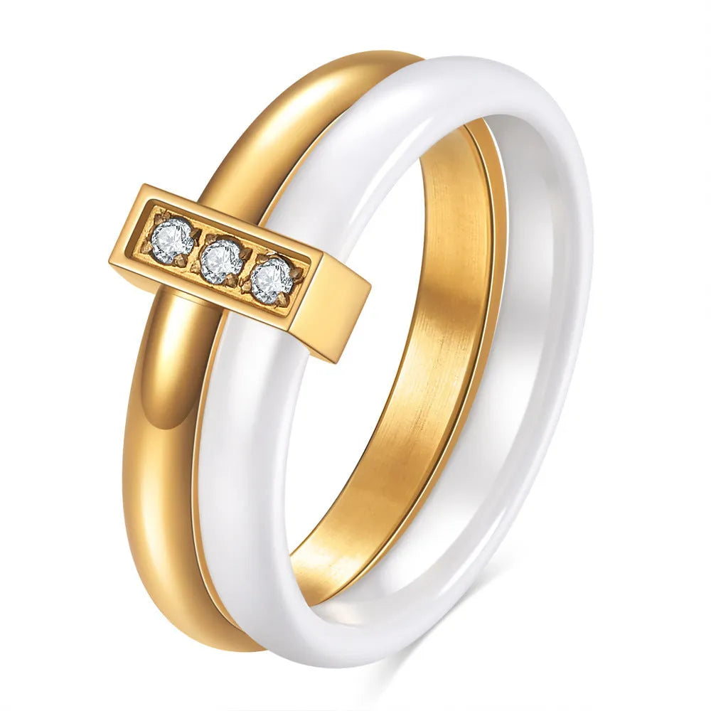 Glossy ceramic women's ring with geometric shape and stitching detail in steel black or gold white finish