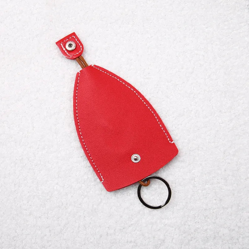 Cartoon-themed PU leather car key case with pull-out mechanism measuring 14x7.5 cm