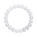 White Hetian jade barrel bead bracelet for men and women on a wrist.