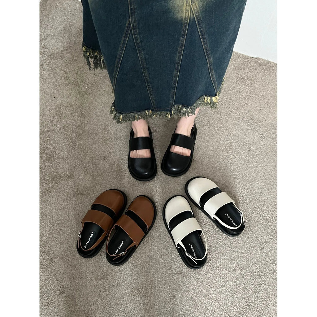 Retro women's closed toe sandals with an adjustable ankle buckle strap in apricot colour.