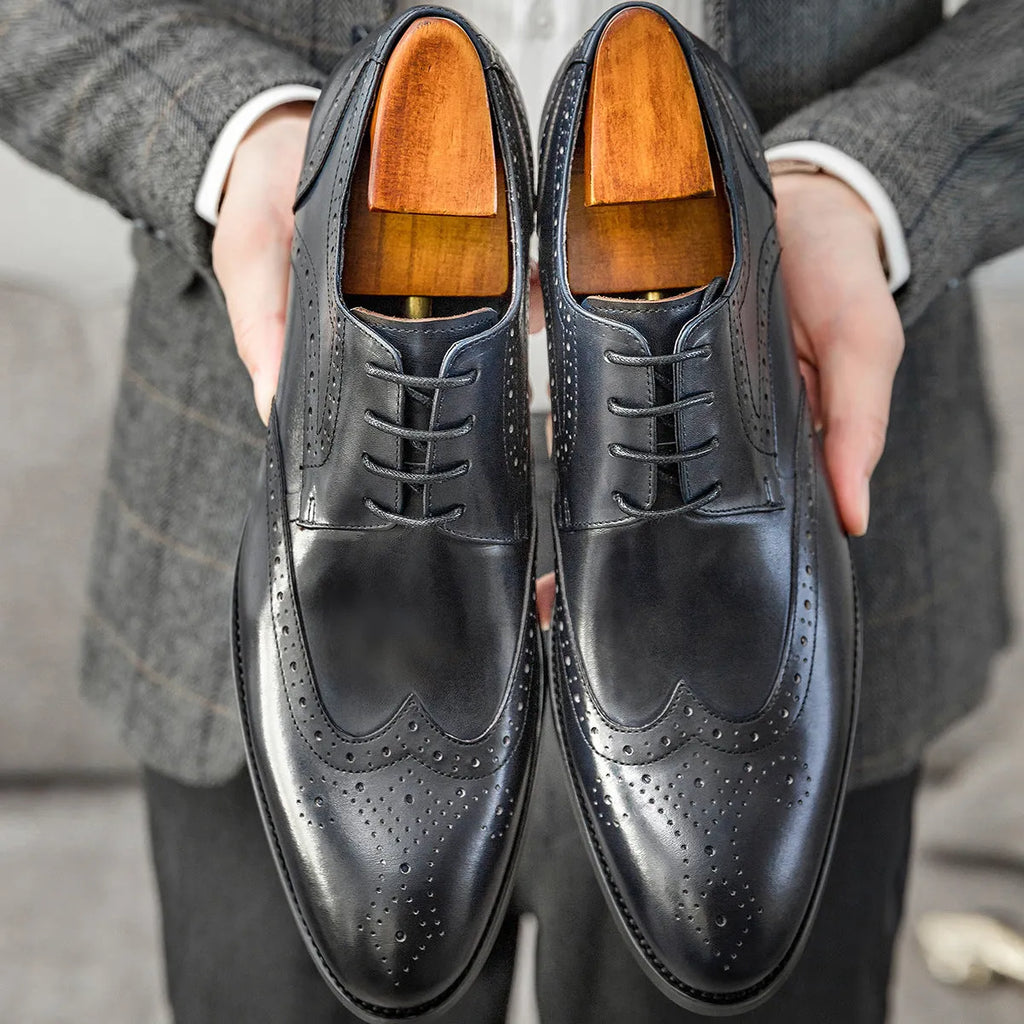 Men's burgundy pointed toe brogue business shoes with carved patterns and lacing