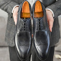 Men's burgundy pointed toe brogue business shoes with carved patterns and lacing