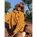 Dopamine yellow plaid loose cardigan shirt for men and women on hanger