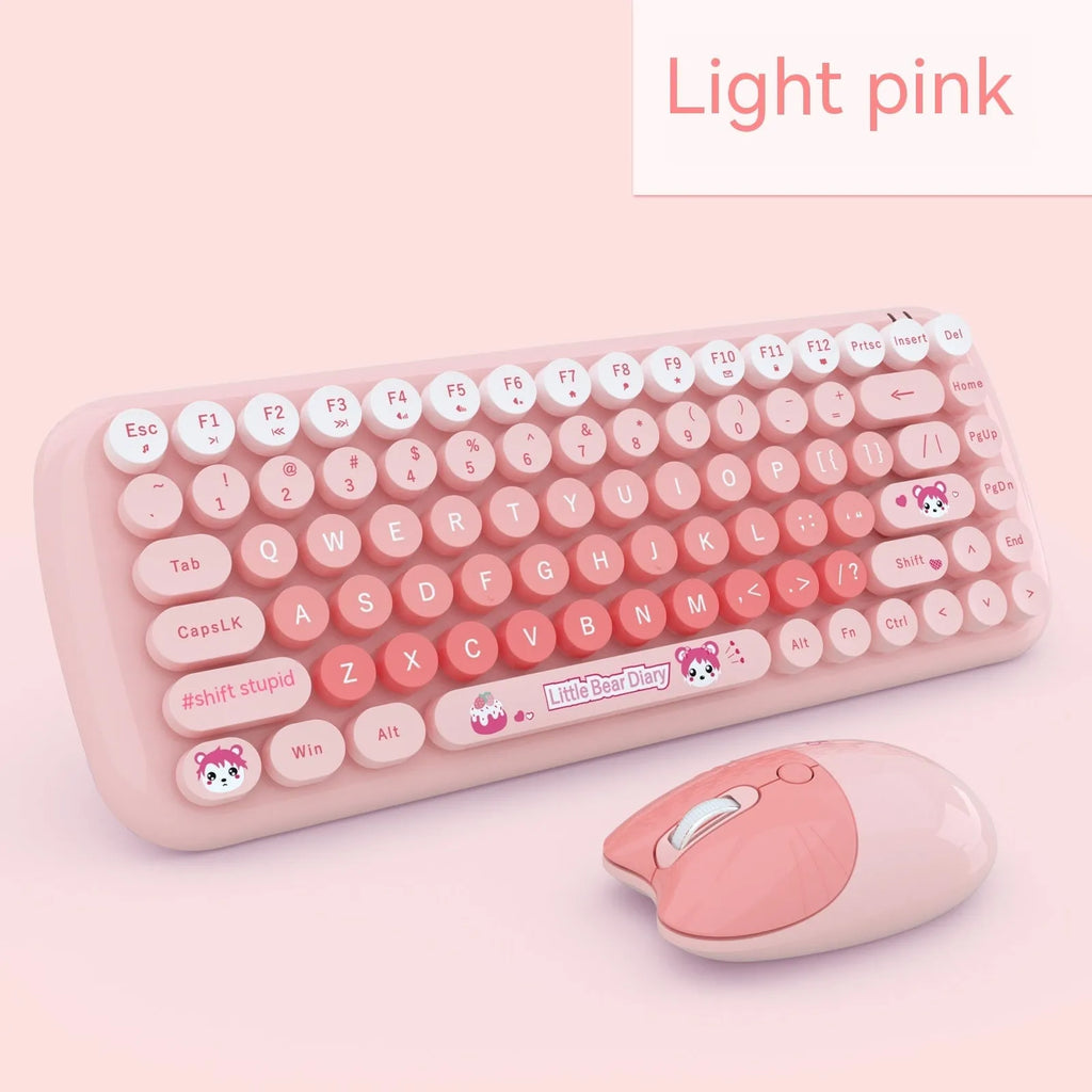 Pink wireless keyboard and mouse set with compact design for desk use