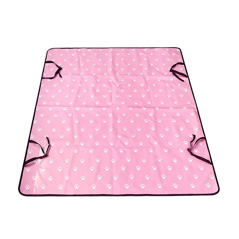 Grey cloth car pet mat with dog bone print protecting a car rear seat