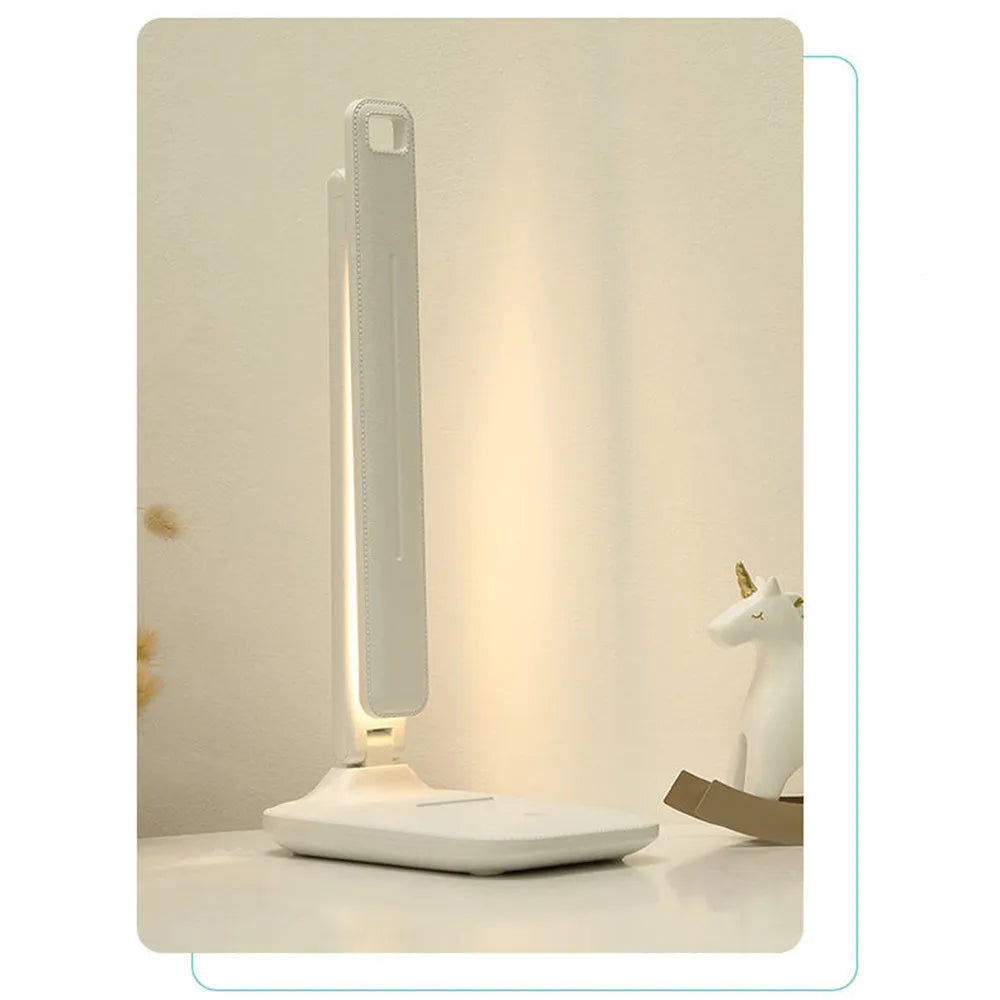 White plastic bedside lamp with touch dimming and colour-changing LED light for children's rooms